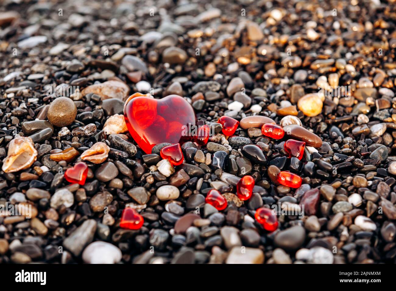 pix Pebble Beach Background Images https www alamy com red hearts on a pebble beach background of stones and hearts image338538220 html