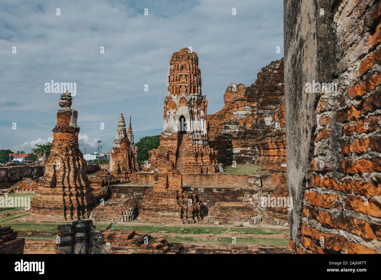 Amazing details of the Wat Maha That temple with the ruins of the Buddha statues. Stock Photo