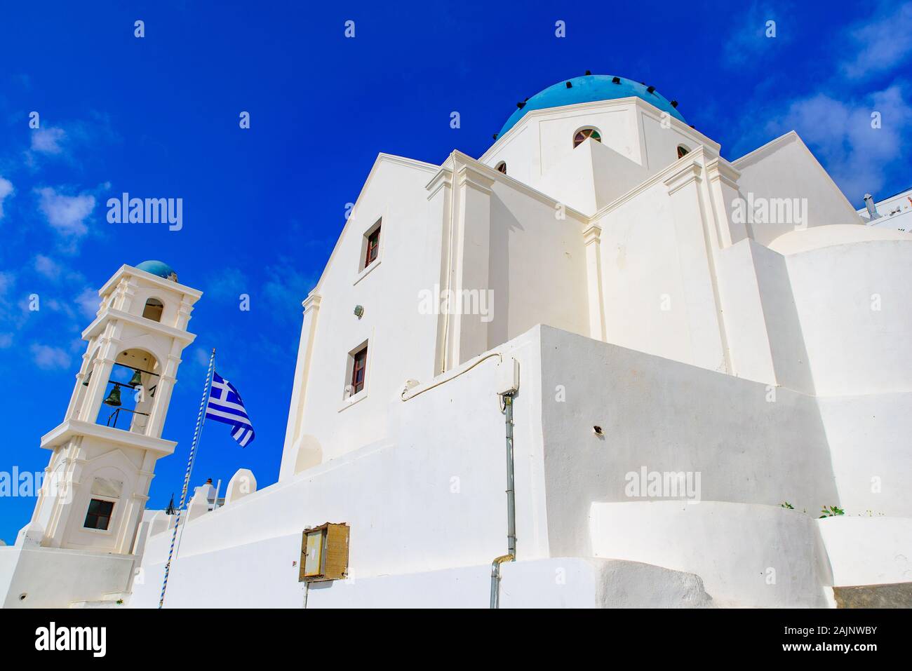 A blue domed church with bell tower in Imerovigli village, Santorini, Greece Stock Photo
