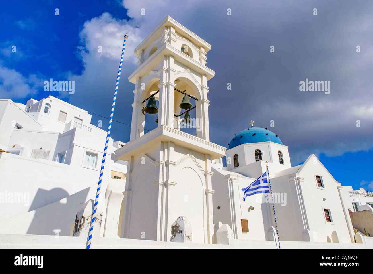 A blue domed church with bell tower in Imerovigli village, Santorini, Greece Stock Photo