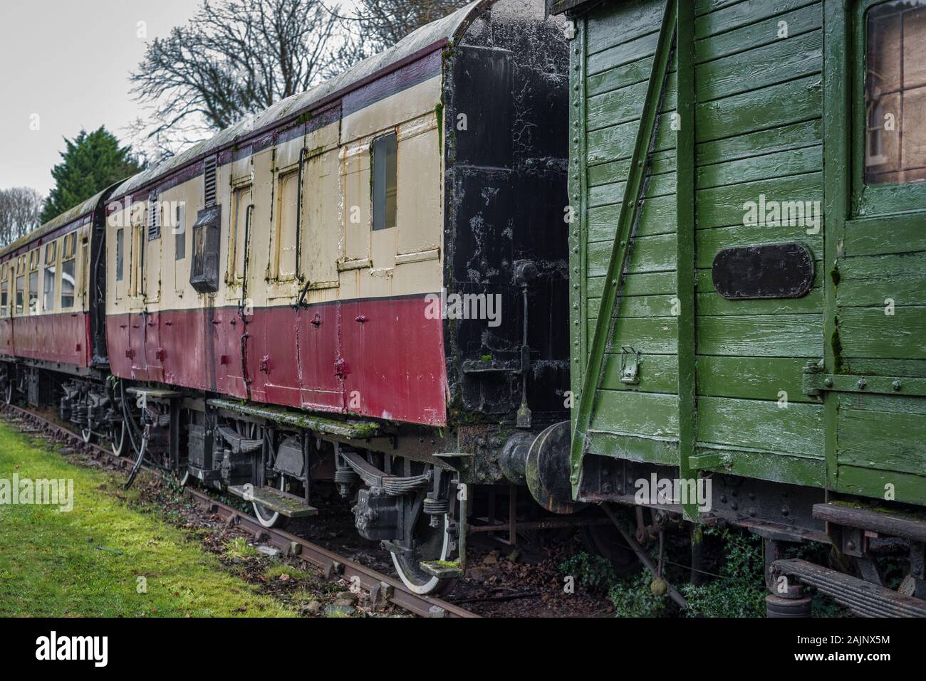 Old train carrages on a disused railway track Stock Photo