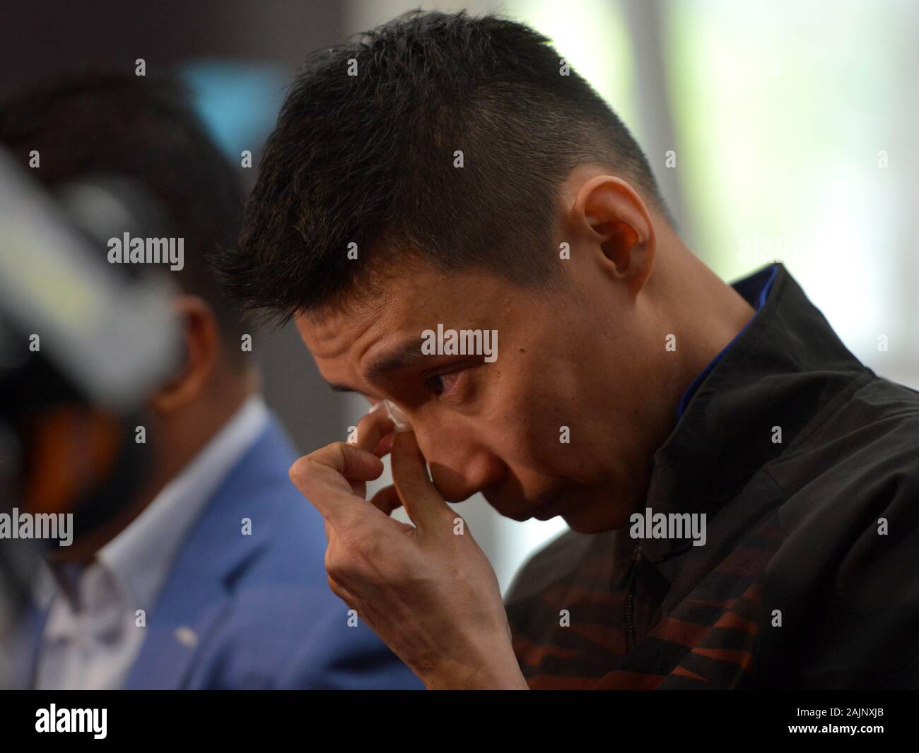 Beijing, Malaysia. 13th June, 2019. Malaysia's badminton player Lee Chong Wei reacts during a news conference to announce his retirement in Putrajaya, Malaysia, June 13, 2019. Credit: Chong Voon Chung/Xinhua/Alamy Live News Stock Photo