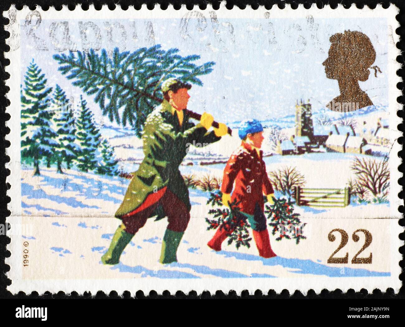 Bringing home christmas tree on british postage stamp stock photo alamy