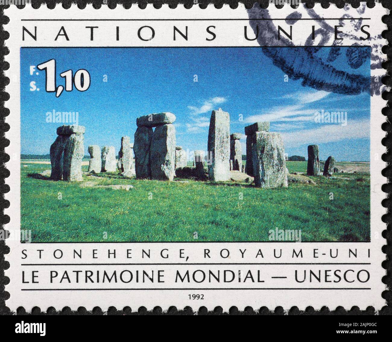 Prehistoric monument of Stonehenge on postage stamp Stock Photo