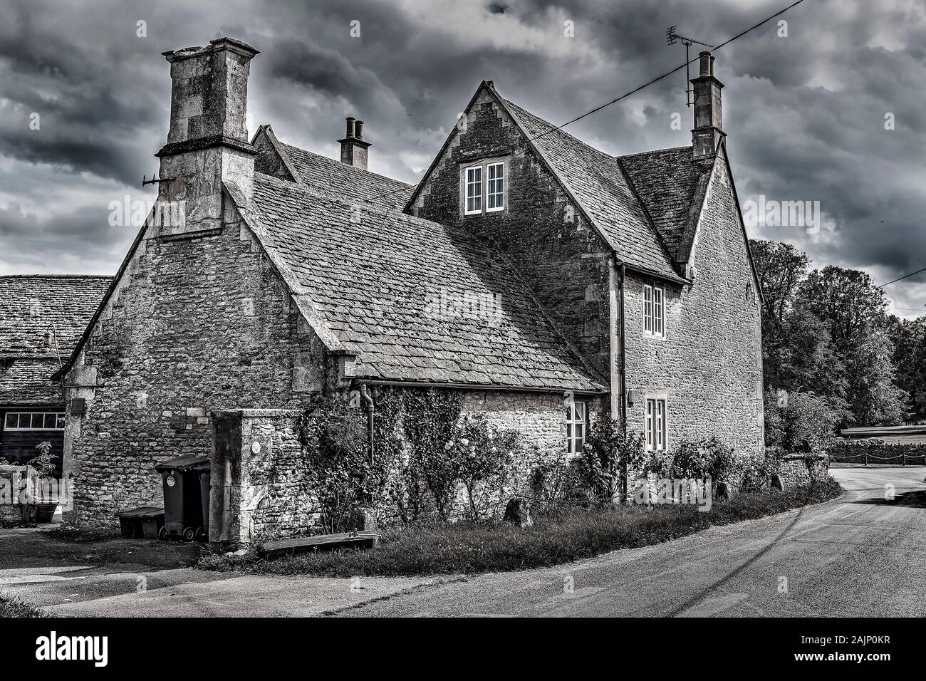 Old stone house in England in dramatic style Stock Photo - Alamy