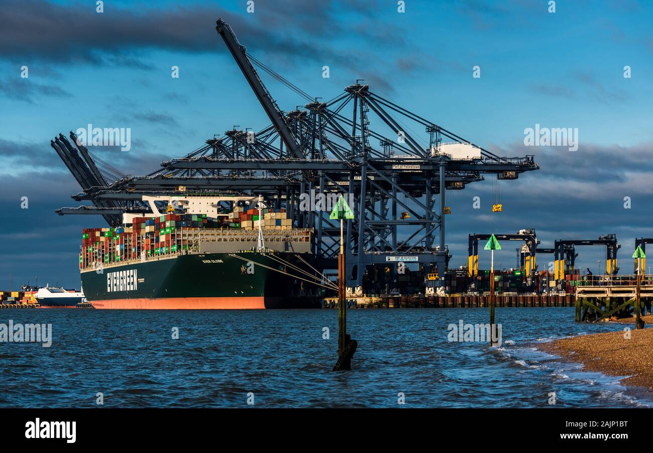 UK Trade - Ever Globe Container Ship Loads and Unloads containers at Felixstowe Port before departing for Hamburg Stock Photo