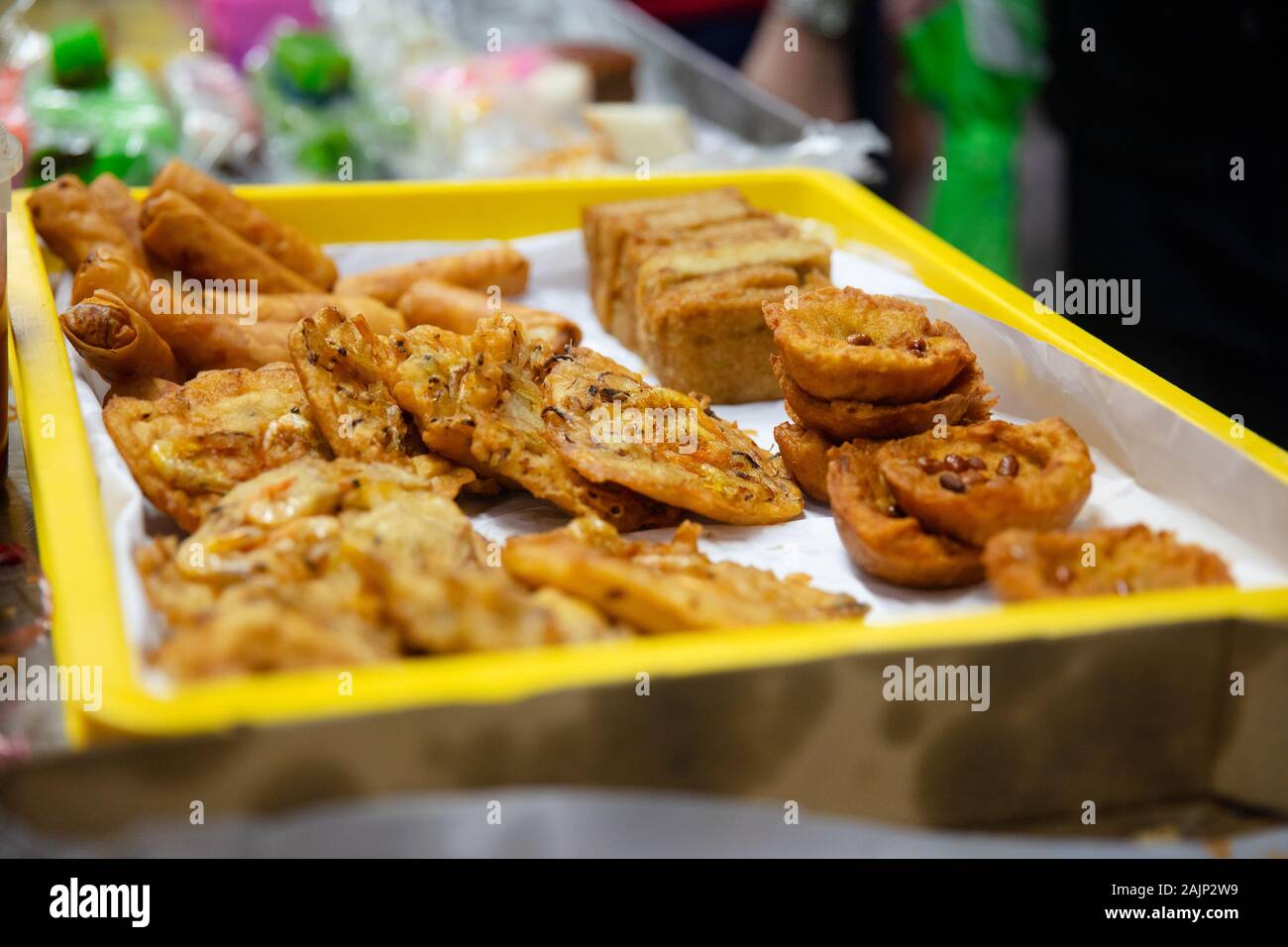 Unhealthy street food in tray at concession stand Stock Photo