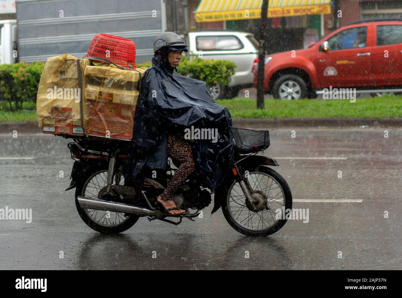 Riding in the rain hi-res stock photography and images - Alamy