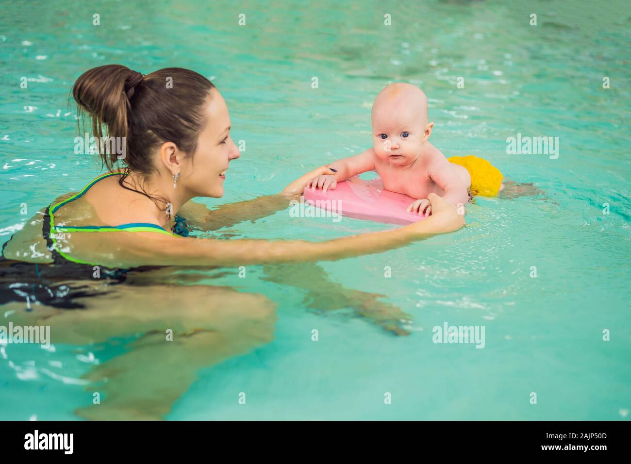 Mom Teaching Baby To Swim Stock Photos Mom Teaching Baby To Swim