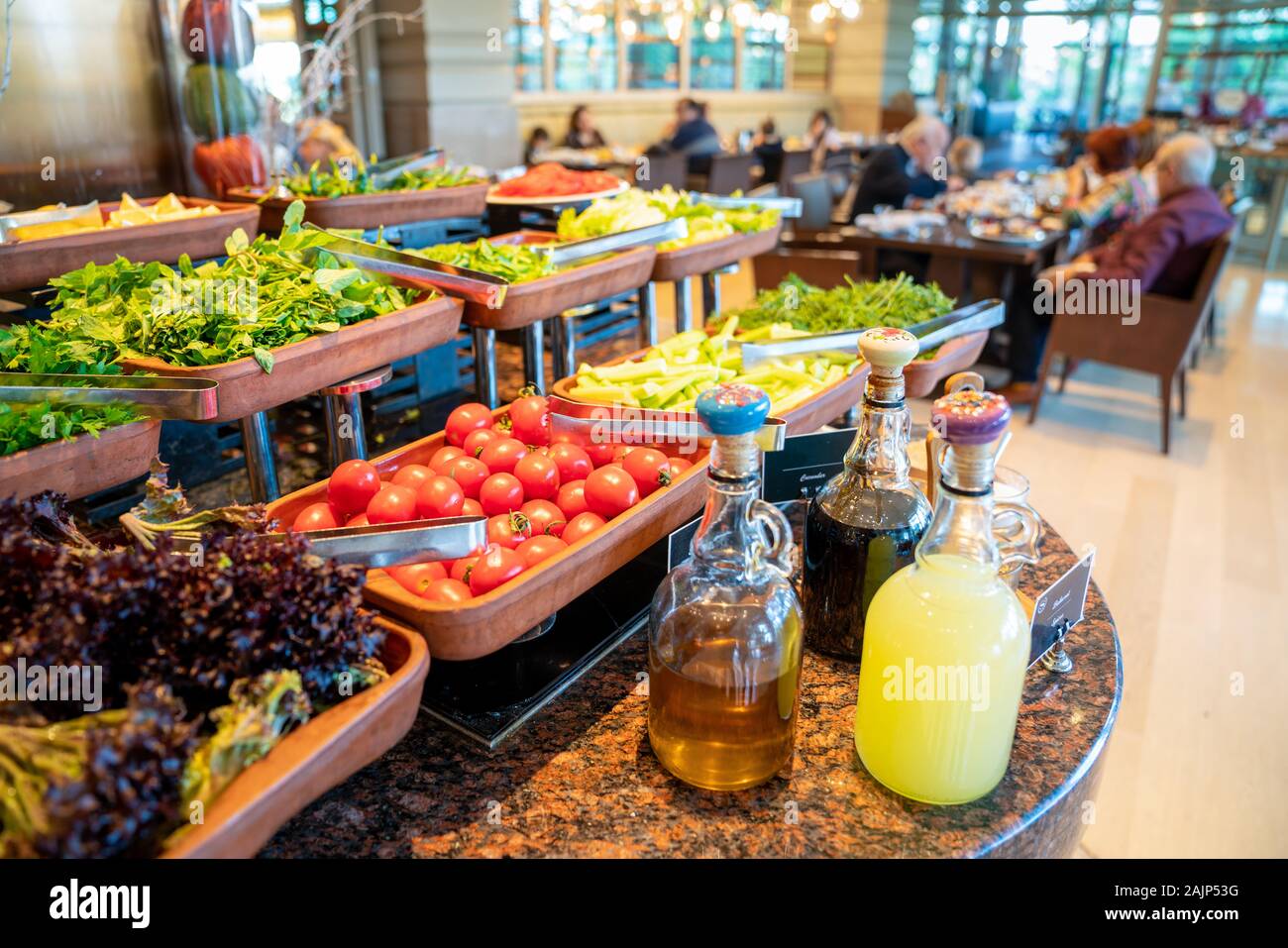 A delicious appetizer and salad buffet with various options in a restaurant or hotel. Stock Photo