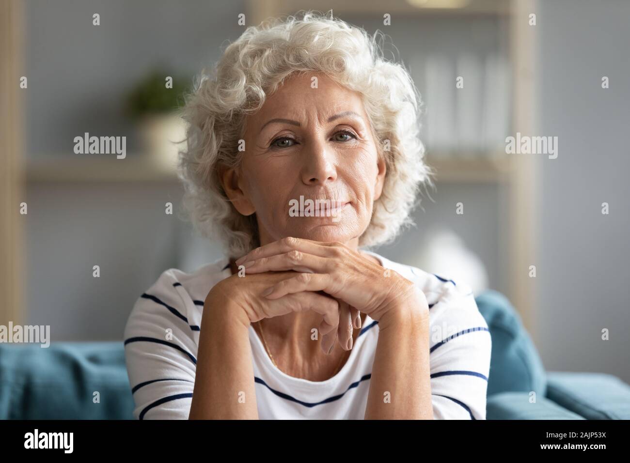 Mature woman posing for camera hi-res stock photography and images - Alamy