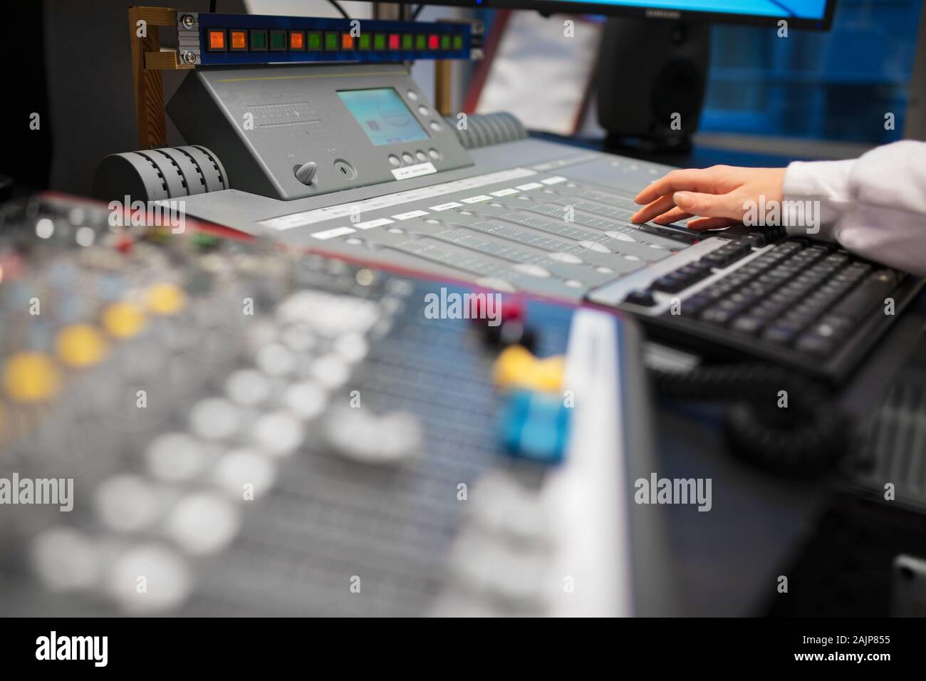 Female Radio Host Using Music Mixer In Studio Stock Photo Alamy