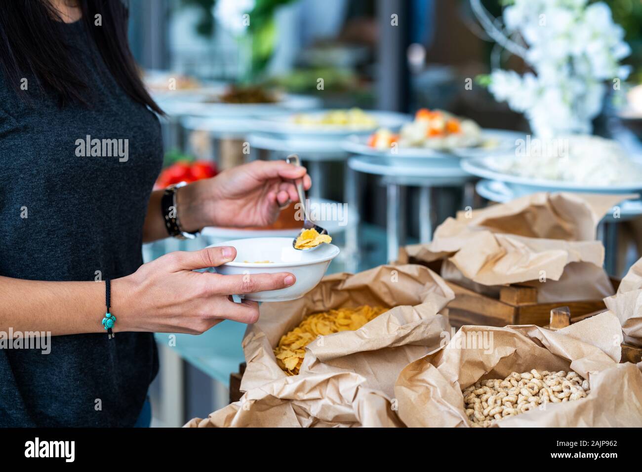 A various cereal buffet with different sweet bakery in a restaurant or hotel. Stock Photo