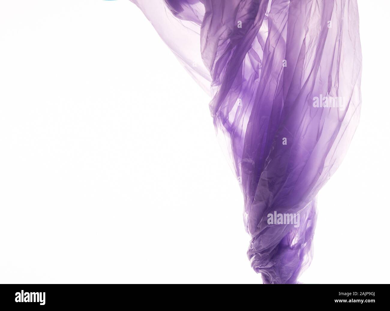 https://c8.alamy.com/comp/2AJP9GJ/rubbish-disastering-planet-or-ecology-concept-tornado-of-plastic-purple-bag-on-white-background-copy-space-2AJP9GJ.jpg