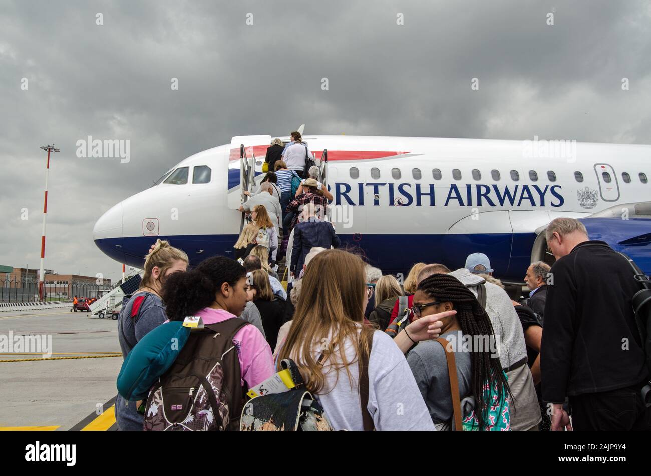 VENICE, ITALY - MAY 22, 2019:  Passengers queuing to board a British Airways Airbus A319 plane at Marco Polo Airport, Venice. Stock Photo