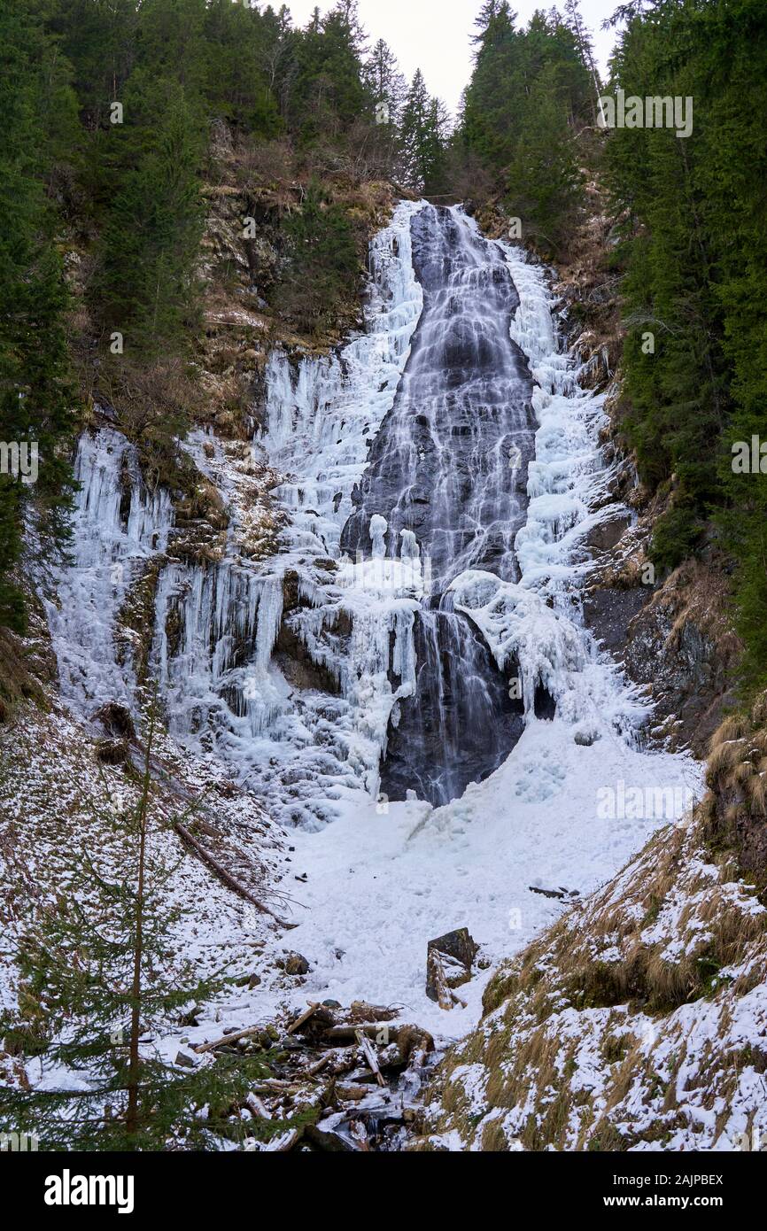 Winter landscape with mountain waterfall frozen on the edges Stock ...