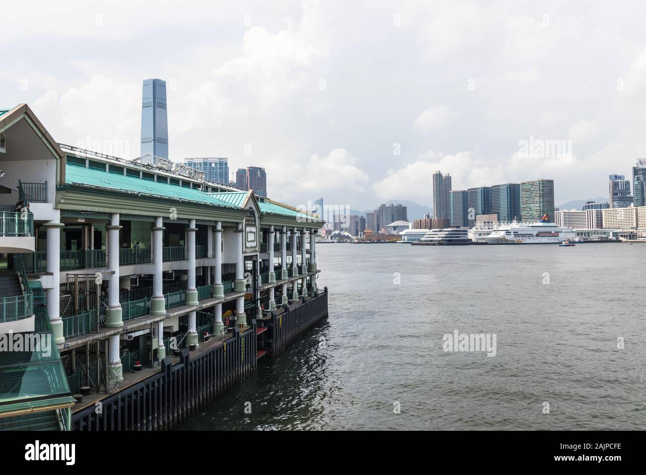 The Star Ferry Pier and view of the International Commerce Center and Tim Sha Tsui District, Hong Kong Stock Photo