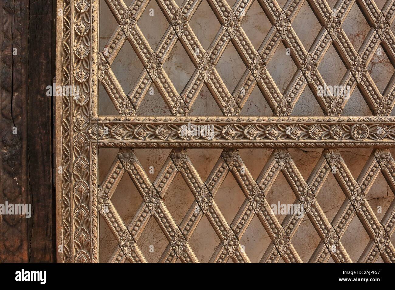 Old Nepalese wood carving, background. Nepal. Stock Photo