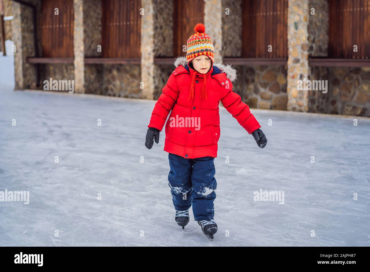 Young boy figure skating hires stock photography and images Alamy