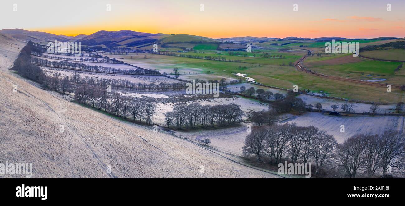Panorama Of A Frosty Winter Landscape In The Hilly Scottish Borders At Sunset Stock Photo
