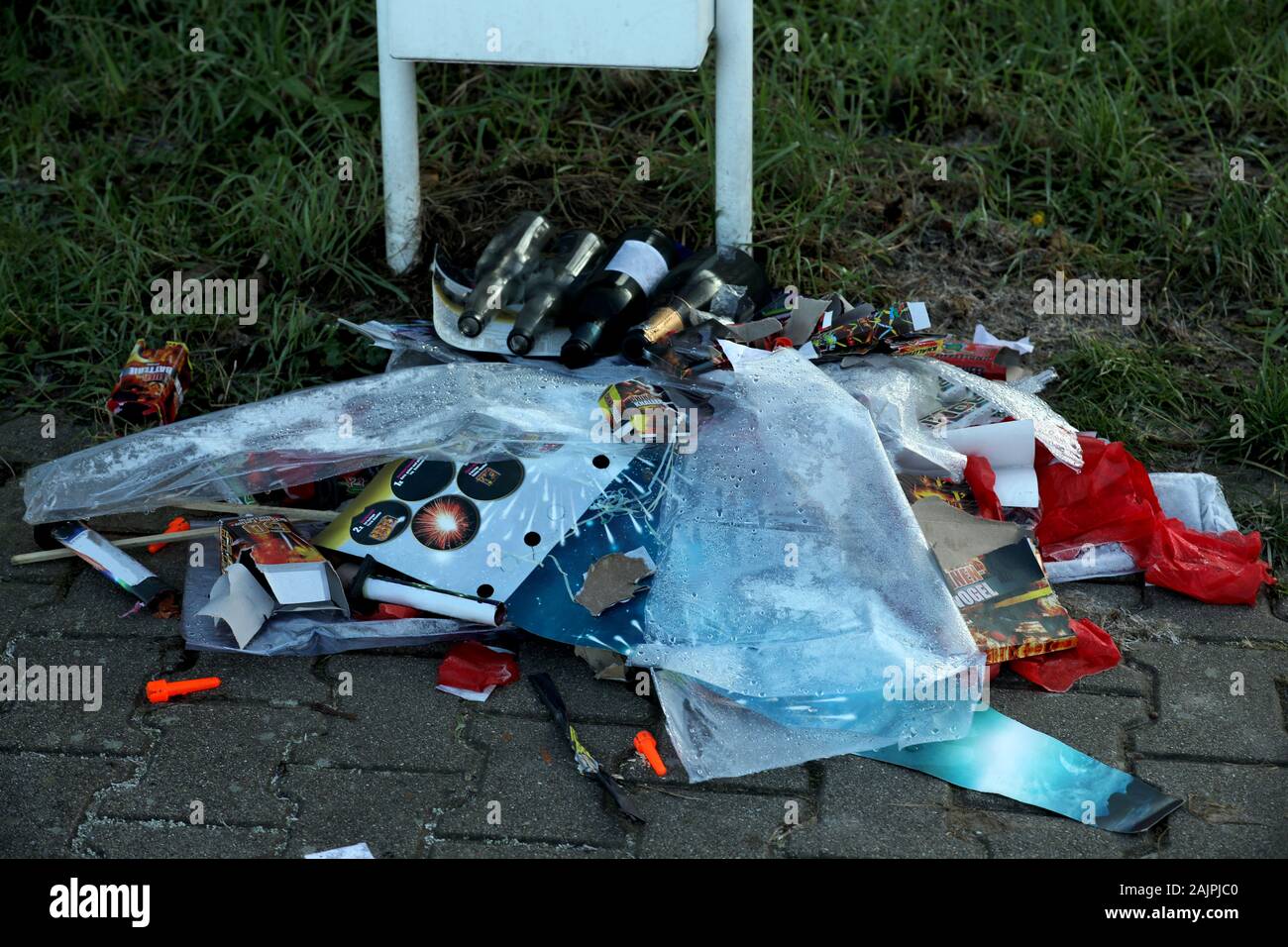 New Year's garbage on the street Stock Photo Alamy