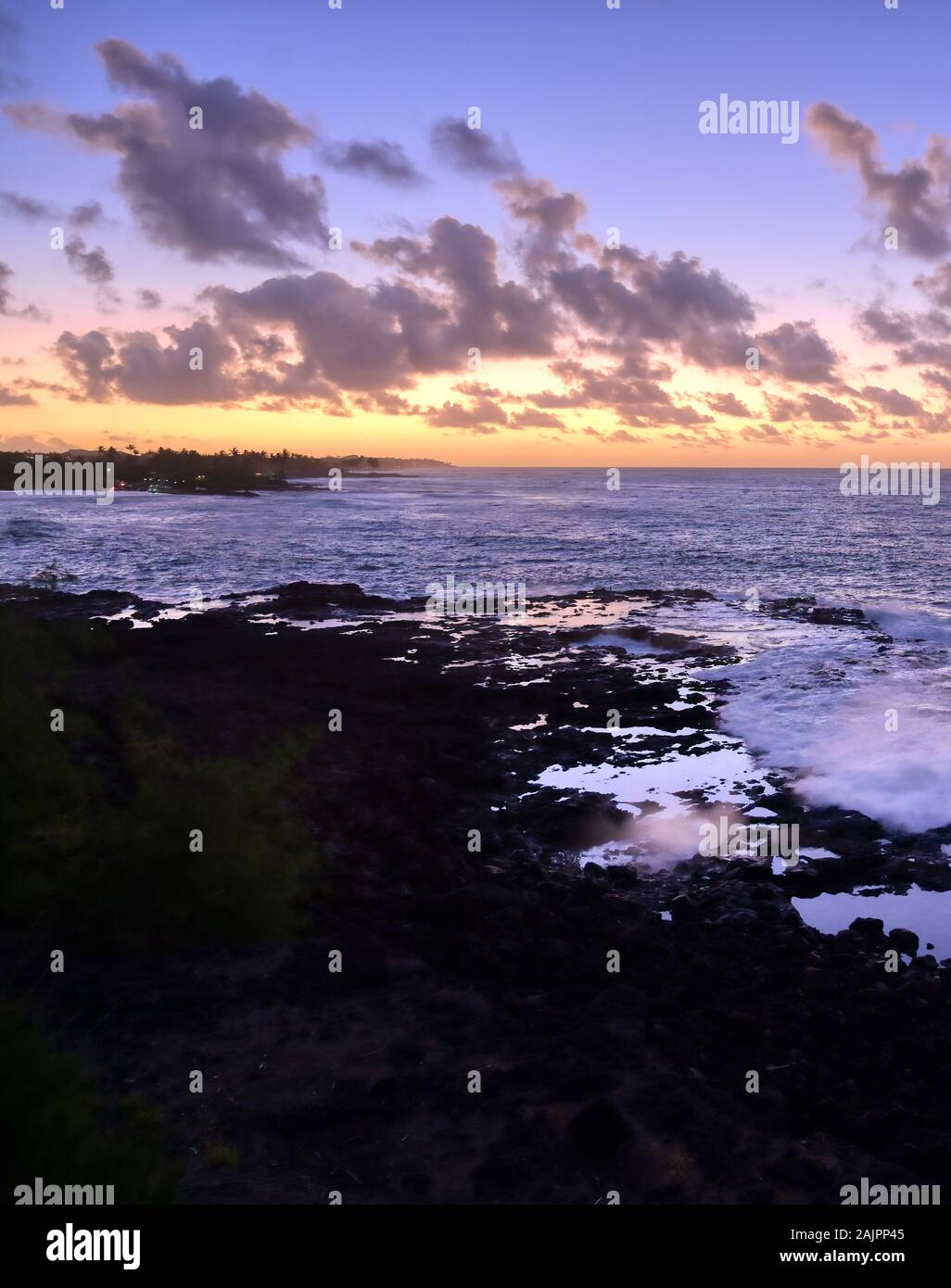 Sunrise over the coast of Kauai, Hawaii Stock Photo - Alamy