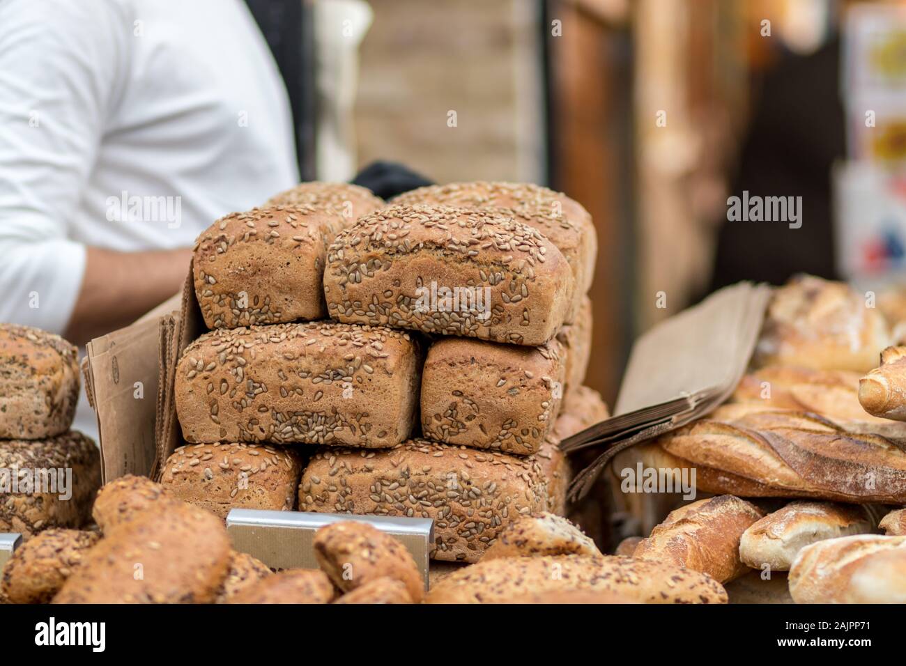 Sourdough bread, whole wheat flour. Arranged in a beautiful pile. Inside wicker baskets Stock Photo