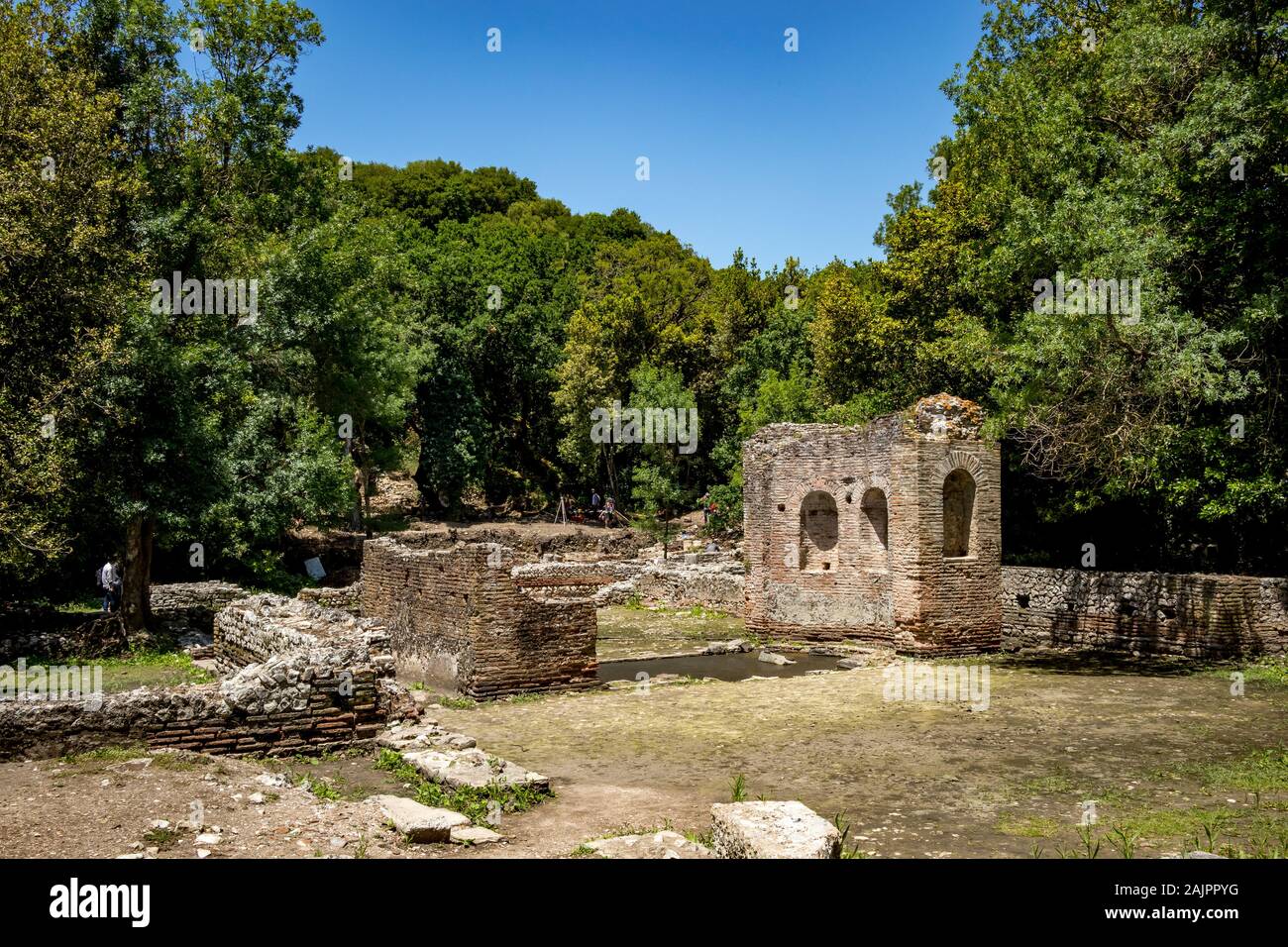 BUTRINT, ALBANIA - JUNE 7, 2019: Excavation works in progress. Beautiful warm spring day and archeological ruins at Albanian UNESCO heritage. Travel photography with fresh green flora Stock Photo