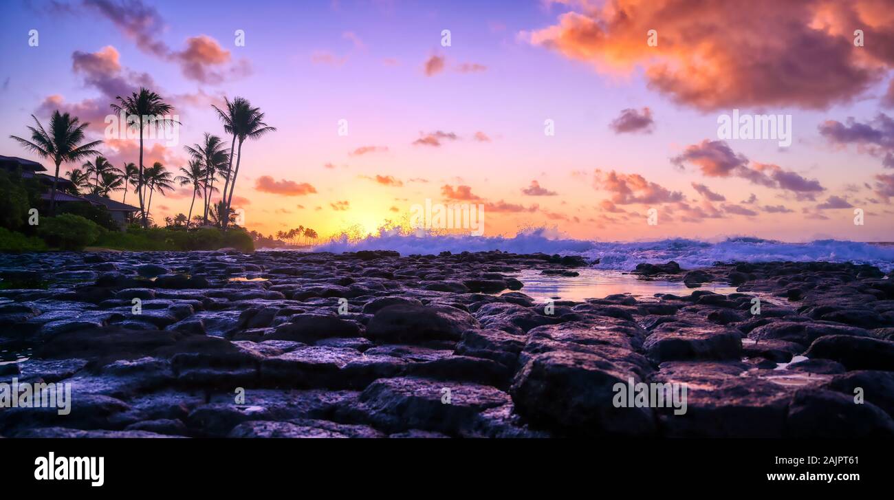 Sunrise over the coast of Kauai, Hawaii Stock Photo - Alamy