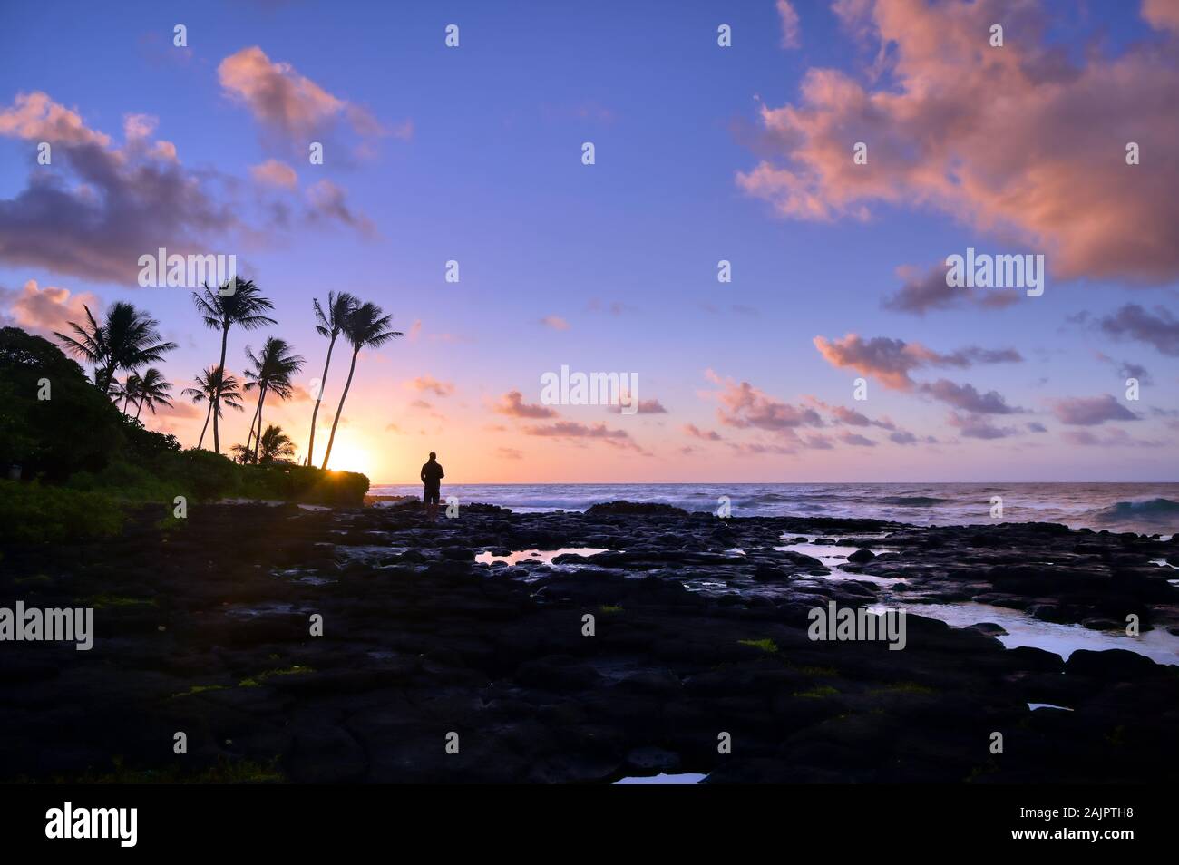 Sunrise over the coast of Kauai, Hawaii Stock Photo - Alamy