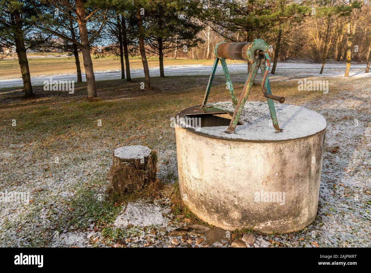 An old well in the countryside, the photo was taken in cold weather. Stock Photo