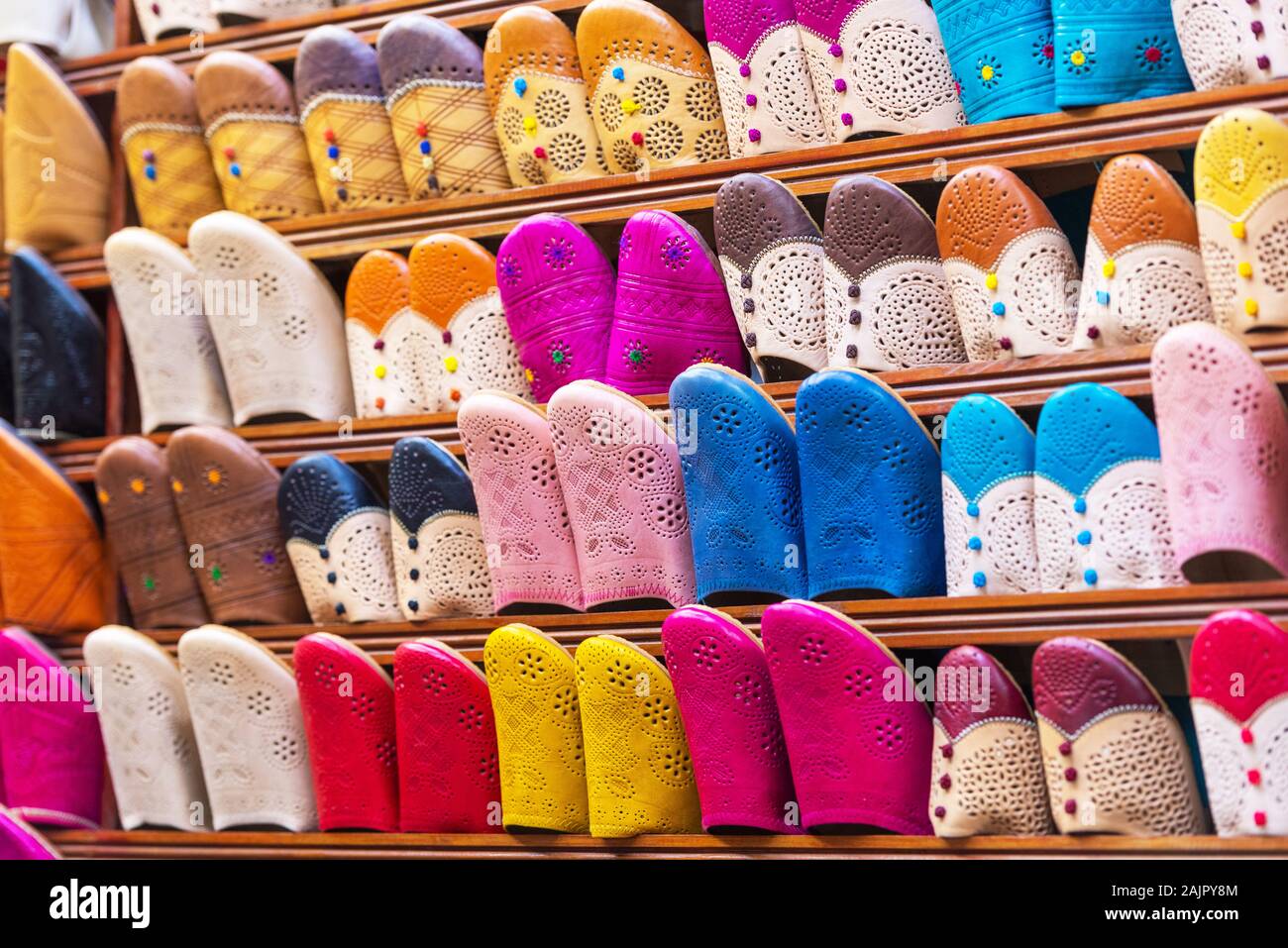 Traditional vibrant Moroccan slippers - 'babouches' on the market in Fez, Morocco Stock Photo