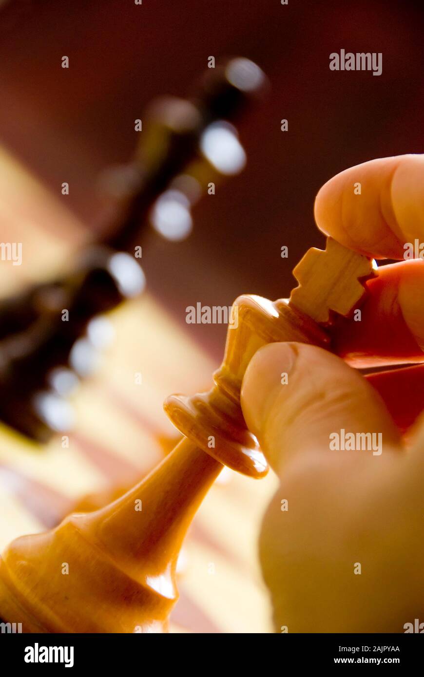 close up of a male hand playing the chess king Stock Photo