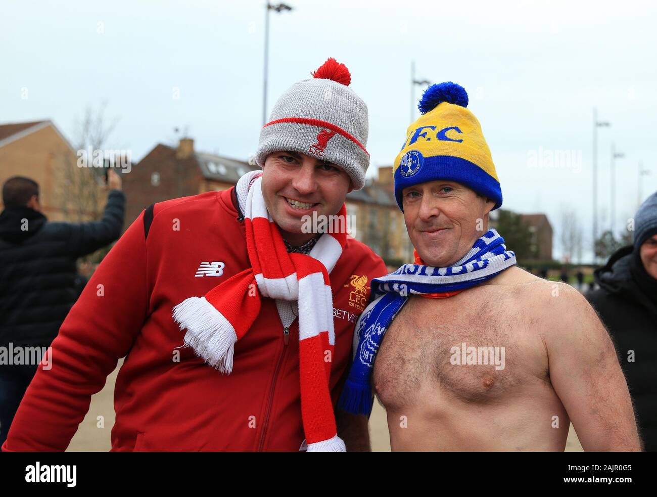 Anfield, Liverpool, Merseyside, UK. 5th Jan, 2020. English FA Cup Football, Liverpool versus Everton; legendary charity fund raiser and Evertonian Speedo Mick poses for a photo with a Liverpool fan outside the stadium, half way through his fundraising walk from John 0'Groats to Lands End. - Strictly Editorial Use Only. No use with unauthorized audio, video, data, fixture lists, club/league logos or 'live' services. Online in-match use limited to 120 images, no video emulation. No use in betting, games or single club/league/player publications Credit: Action Plus Sports/Alamy Live News Stock Photo