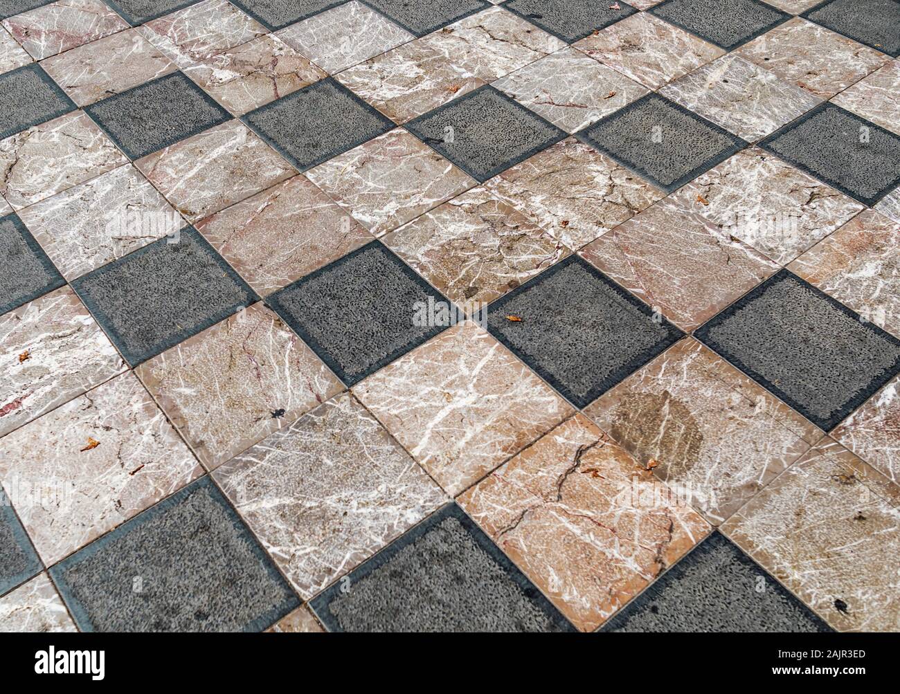 Checkered style floor with black and white tiles Stock Photo