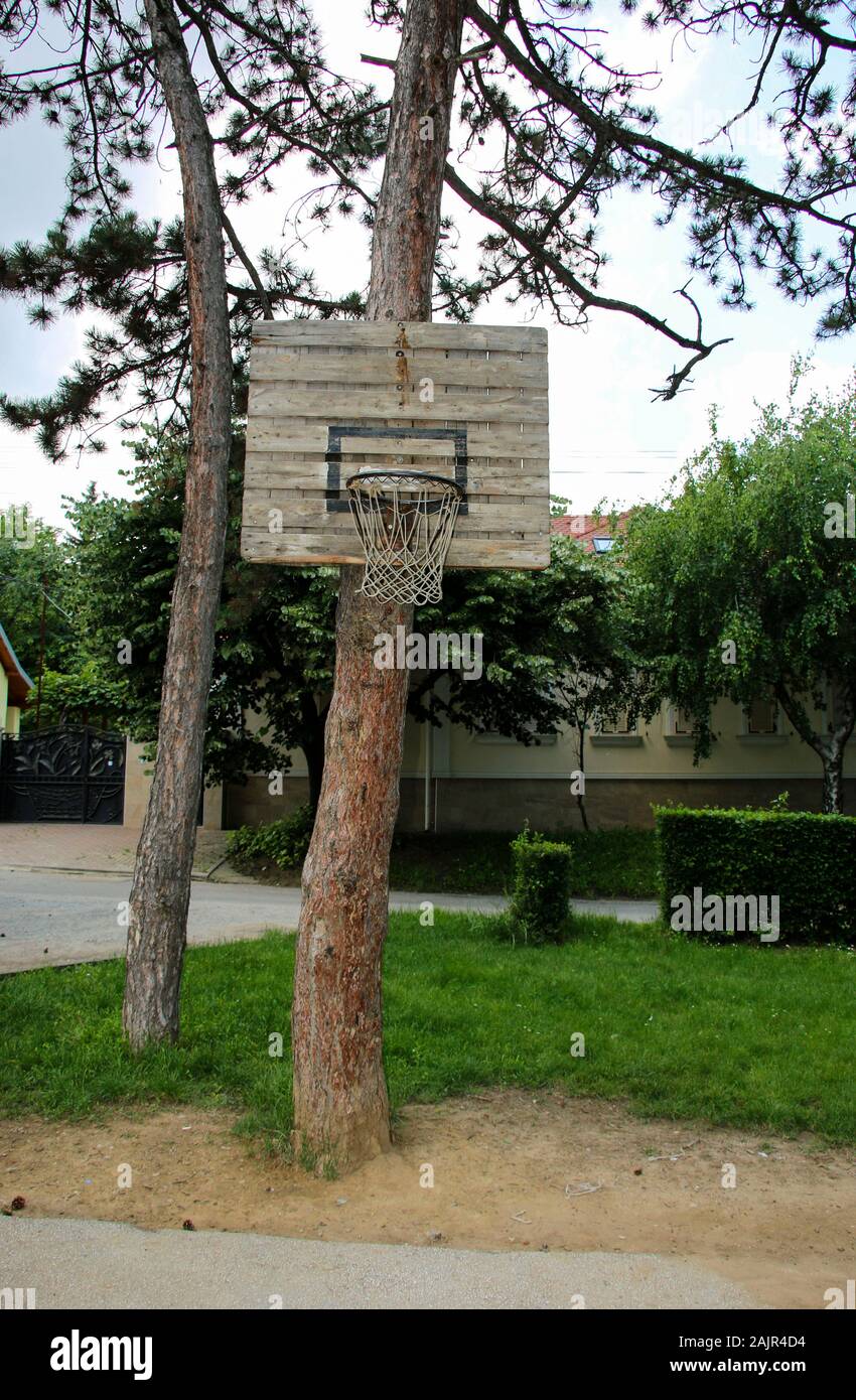 Street public old rusty basketball shield, sport ground at home, active games for children and adults Stock Photo