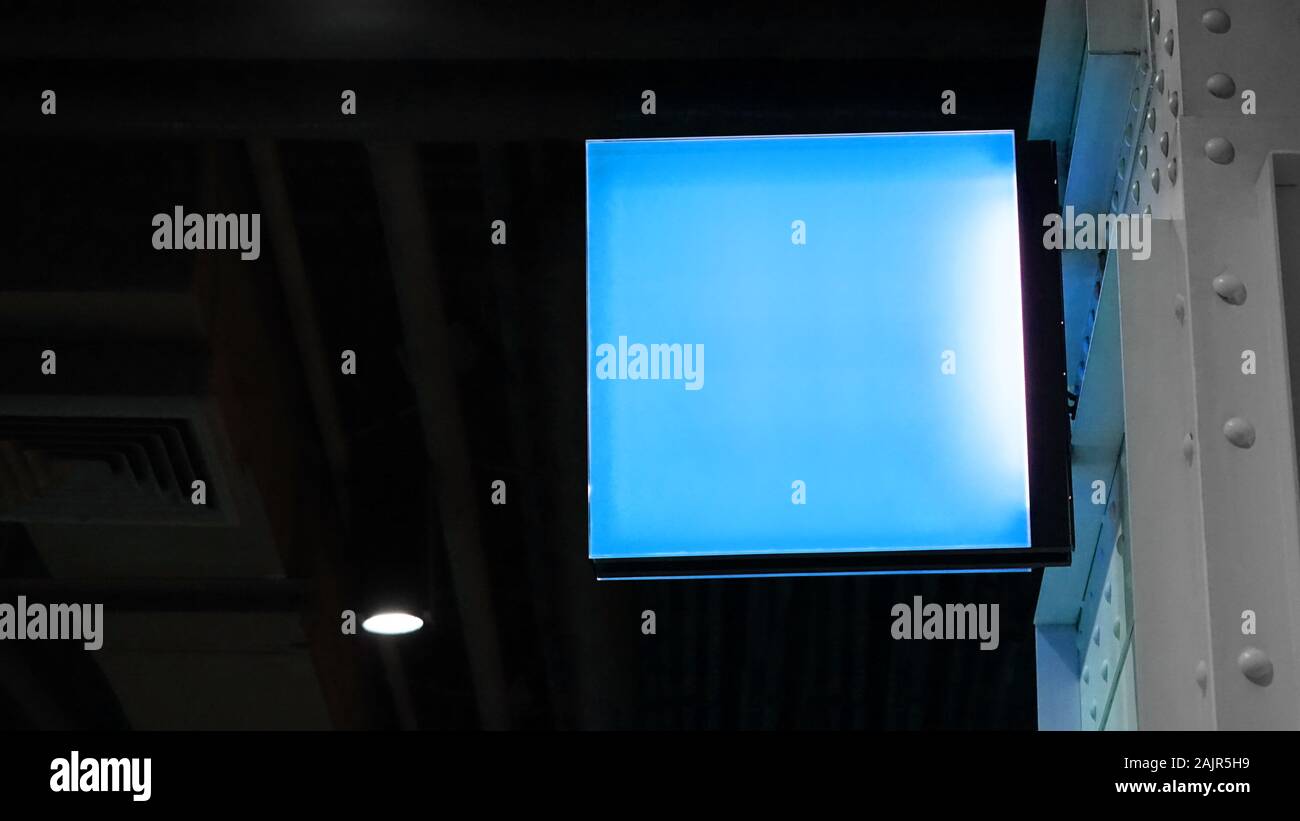 Blank square lightbox signage hang on wall Stock Photo
