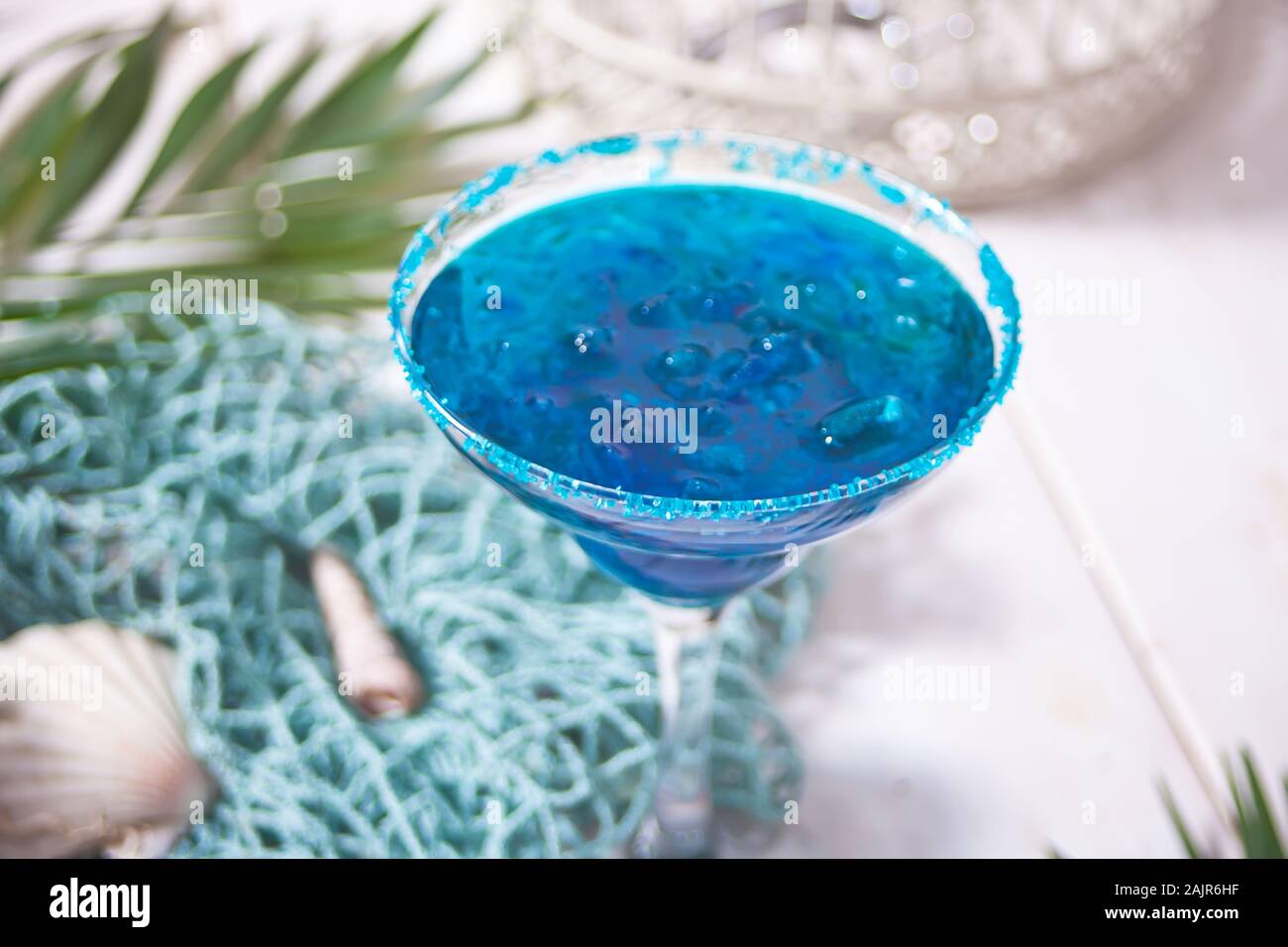 Glass of blue cocktail. Hawaiian cocktai, lagoon cocktail, curacao. Marine theme Stock Photo