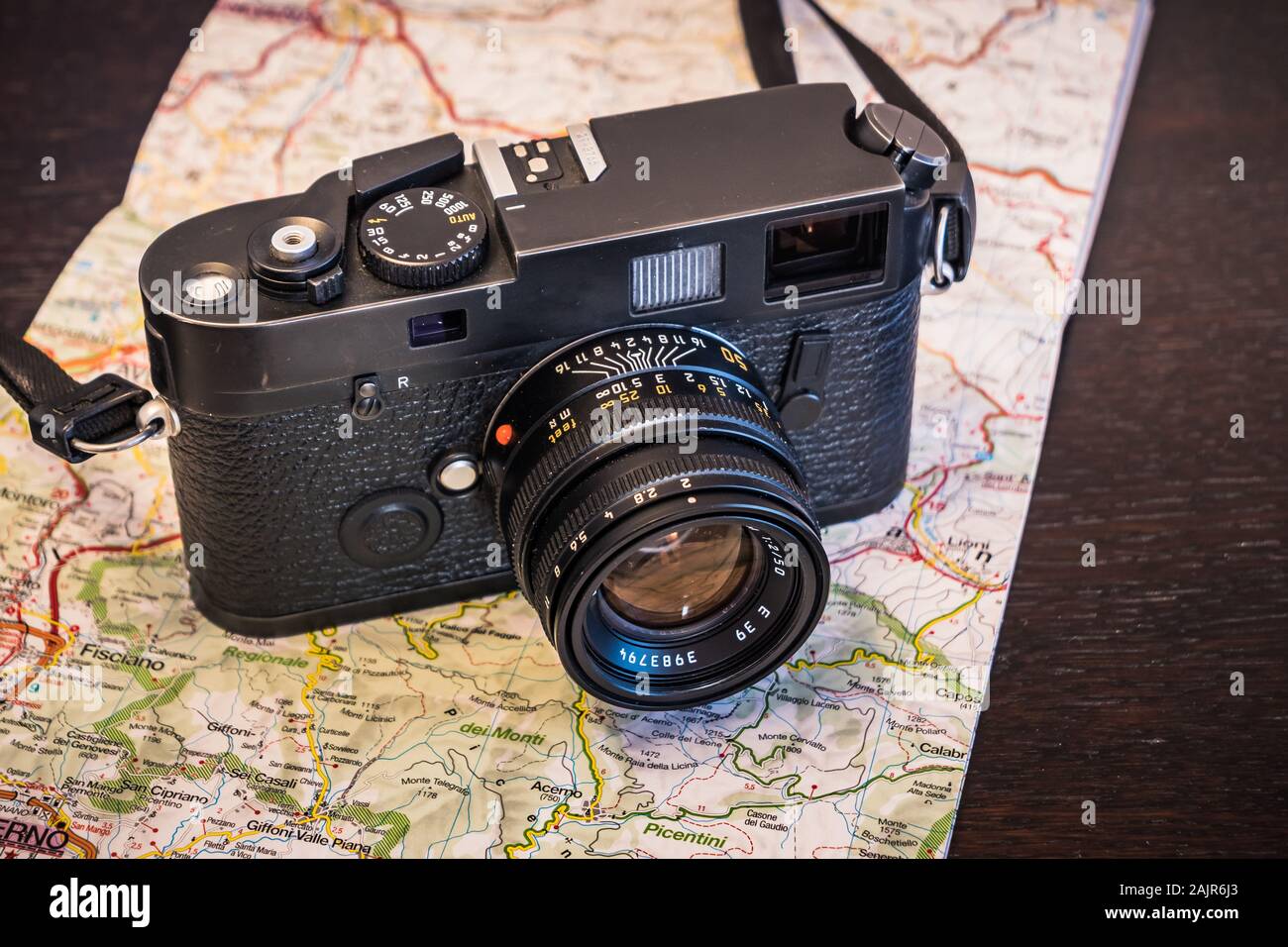 Travel Photography Concept - Vintage Photo Camera and Map Stock Photo