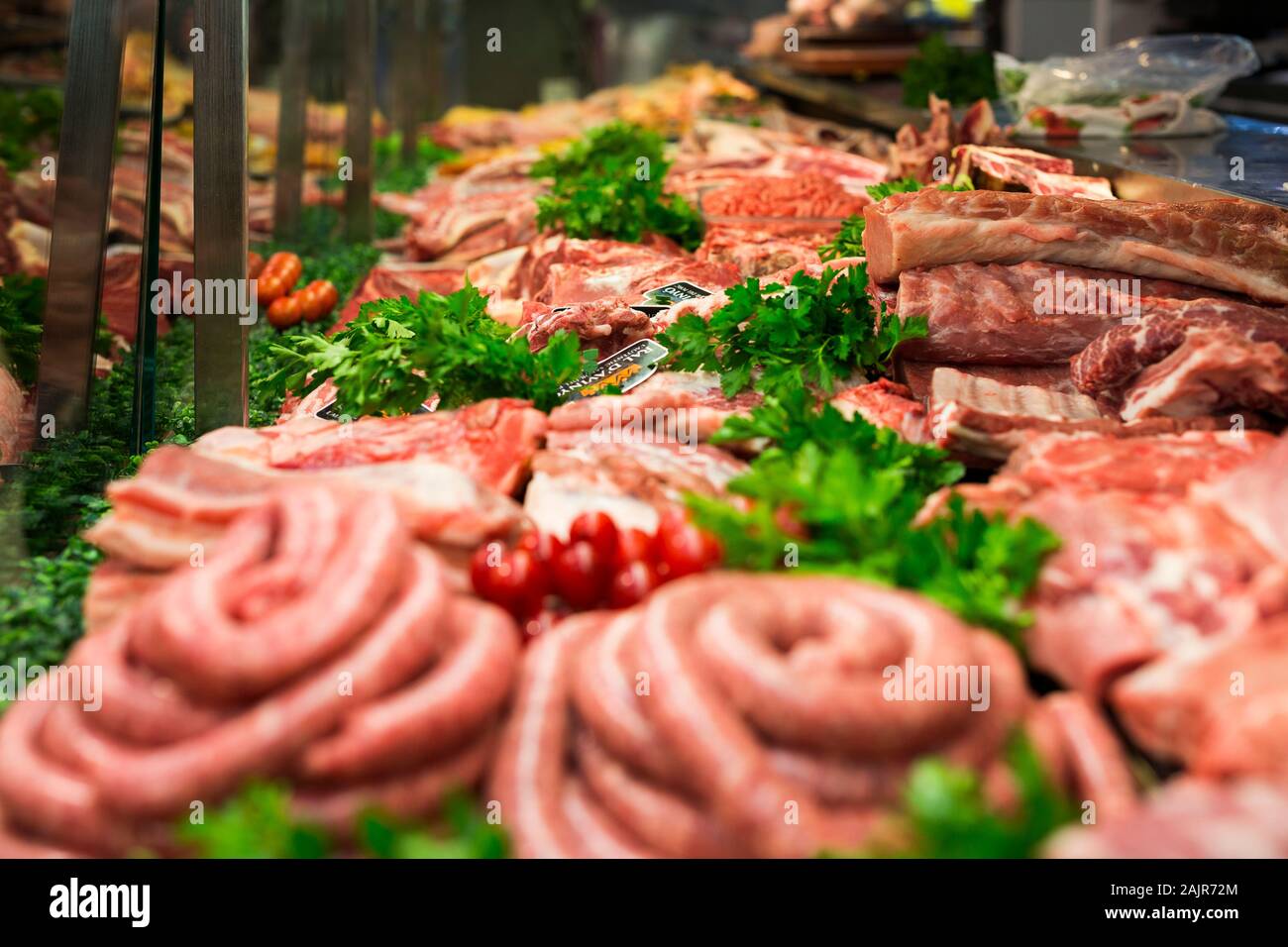 Meat showcase in a butchery Stock Photo Alamy