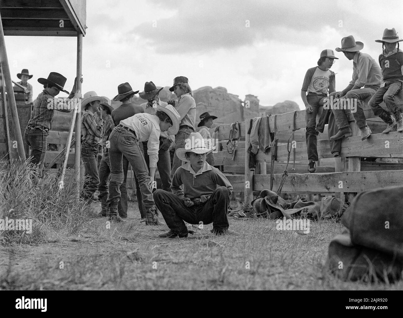 Behind the chutes at the Writing On Stone Rodeo. Alberta Canada. Vintage monochrome circa1983. Title: The Last Rodeo Stock Photo