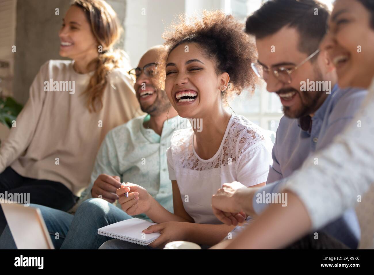 Happy international young people have fun studying Stock Photo