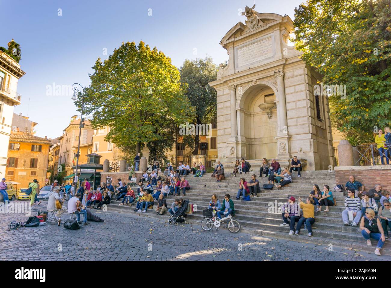 ROME, ITALY - OCTOBER 10, 2017: people are listening to an outdoor concert in Trilussa Square in Trastevere district in Rome, Italy Stock Photo