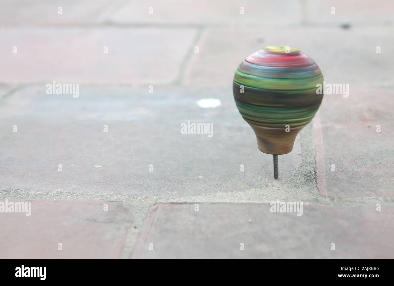Wooden spinning top hires stock photography and images Alamy