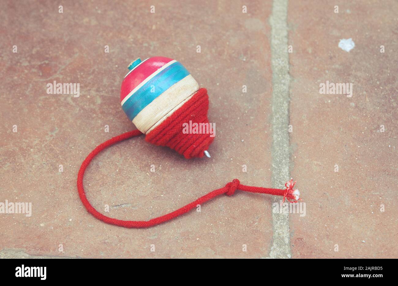 spin top with string