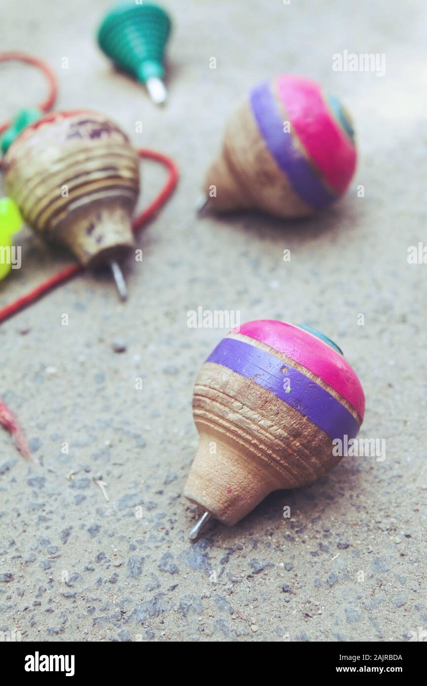 spinning top toy with string