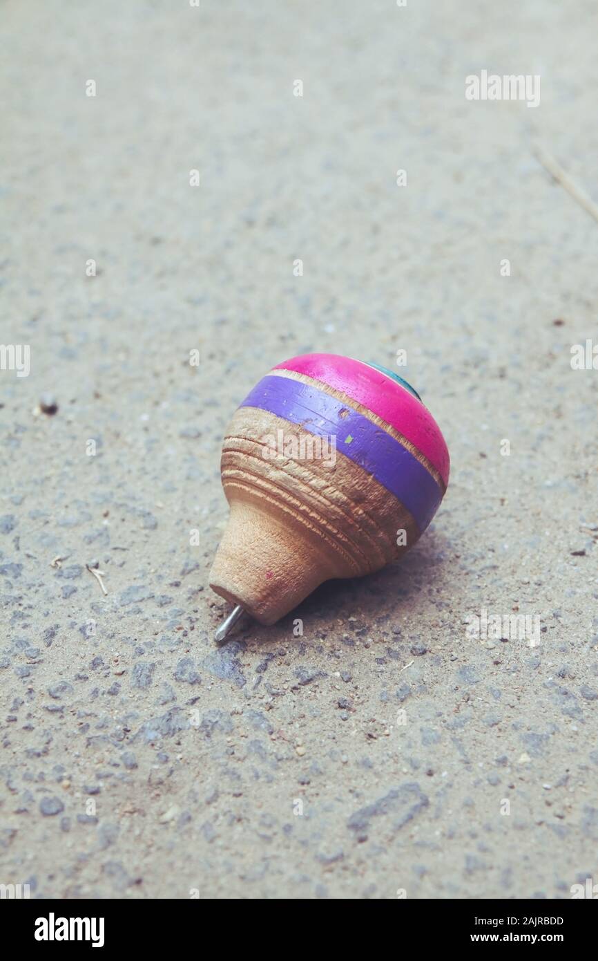spinning top toy with string