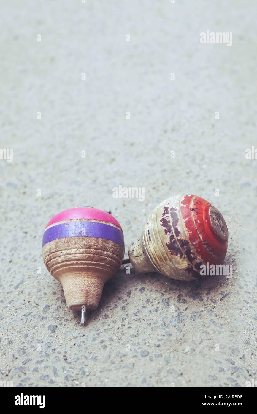 Classic wooden spinning top toy with string Stock Photo Alamy