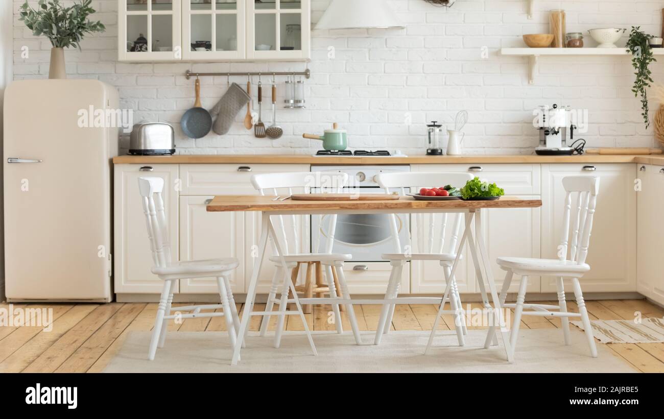 Modern cozy empty light domestic kitchen interior Stock Photo - Alamy