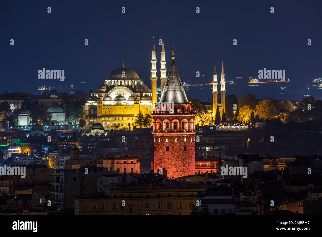Galata Tower and Suleymaniye Mosque at evening time in Istanbul, Turkey and the sea of Marmara on background. Stock Photo